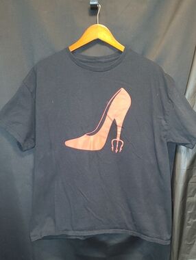 Devil Wears P**da" inspired design of a red stiletto heel shaped like a trident.
